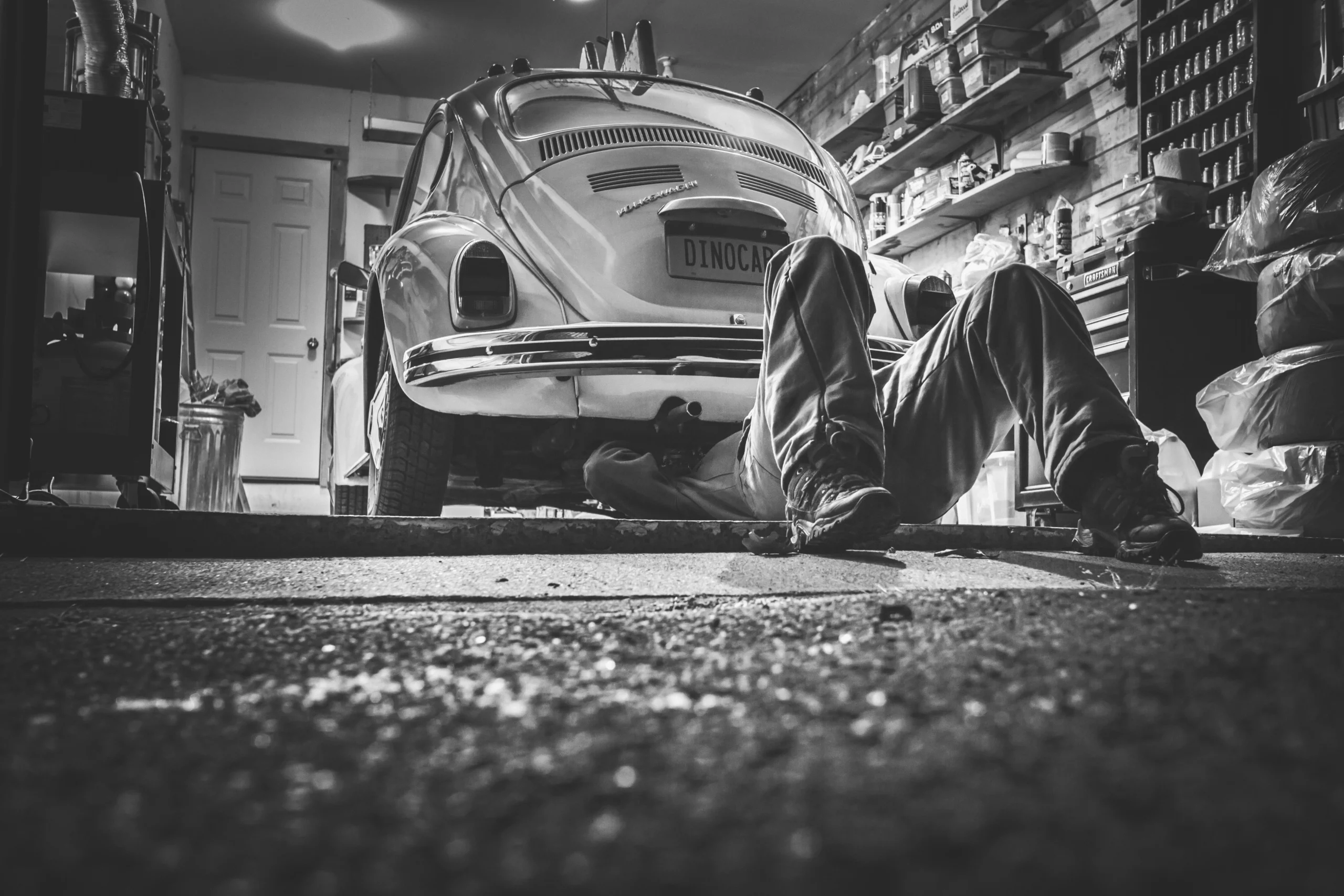 male-painter-overalls-doing-his-work-car-shop